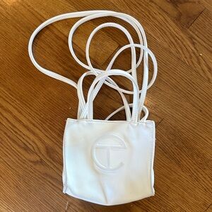 TELFAR unisex tote. Clean good condition. White preowned good condition.